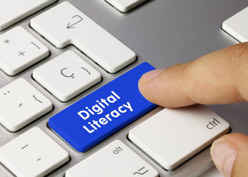 Keyboard with the phrase Digital Literacy on it.